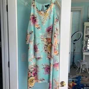 Beautiful floral 3 tier sheer layers  with a handkerchief bottom size S